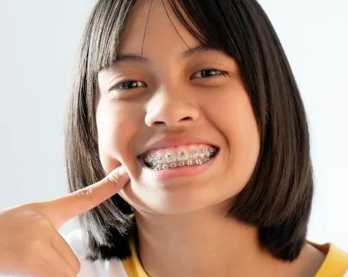 a young female with braces